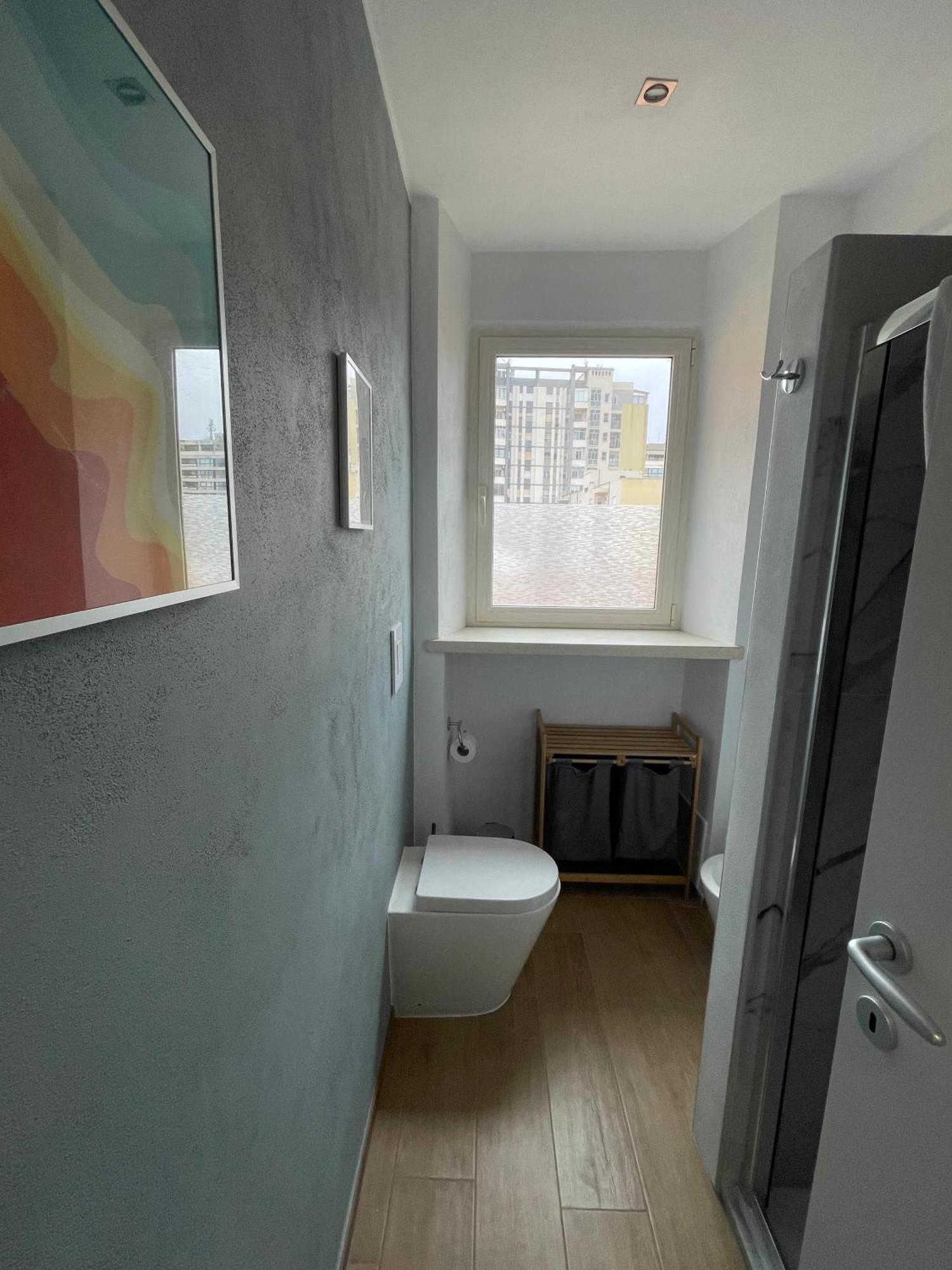 Appartamento Suite Sardinia Holiday กาญารี ภายนอก รูปภาพ